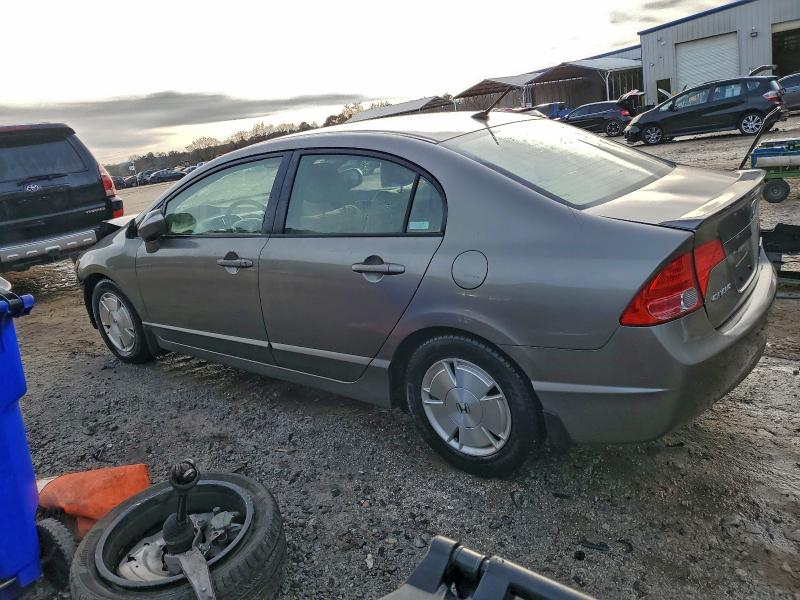 Photo 2 from auction – 2006 HONDA CIVIC HYBR with VIN JHMFA36226S010011