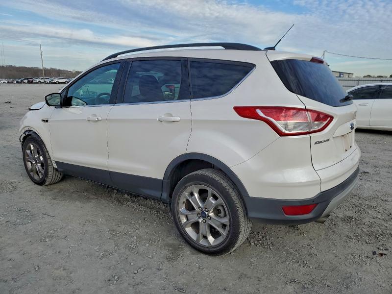 Photo 2 from auction – 2014 FORD ESCAPE SE with VIN 1FMCU9G94EUB53292