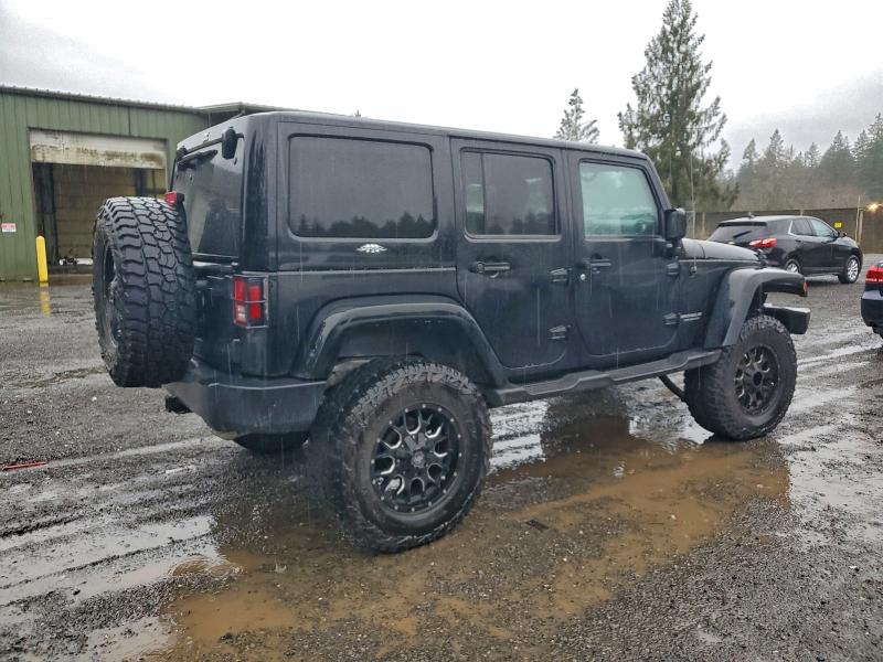 Photo 3 from auction – 2011 JEEP WRANGLER U with VIN 1J4BA3H14BL614842