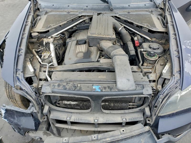 Photo 12 from auction – 2007 BMW X5 3.0I with VIN 5UXFE43597L019289