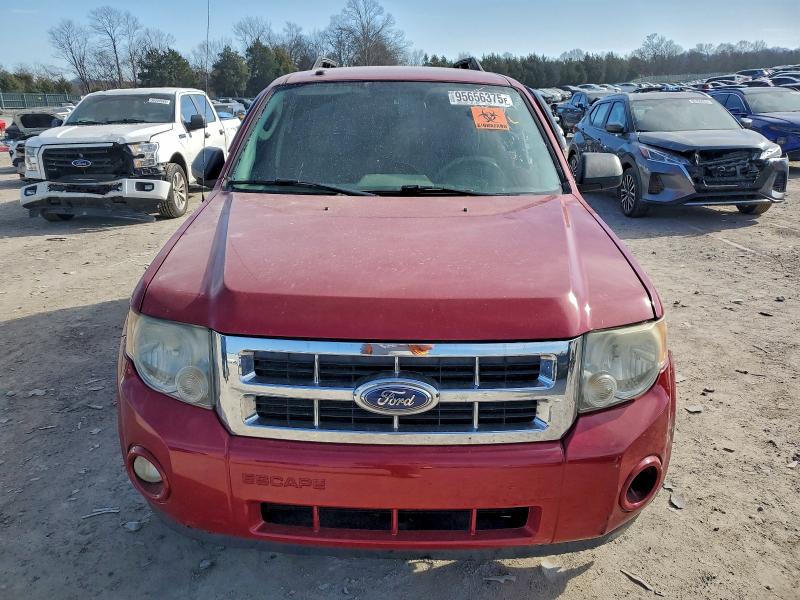 Photo 5 from auction – 2011 FORD ESCAPE with VIN 1FMCU0D71BKB69990