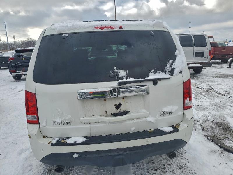 Photo 6 from auction – 2013 HONDA PILOT TOUR with VIN 5FNYF4H97DB062725