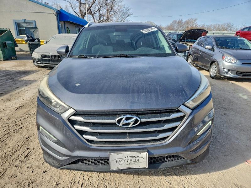 Photo 5 from auction – 2017 HYUNDAI TUCSON LIM with VIN KM8J3CA42HU314120