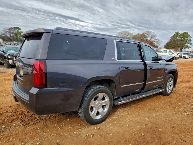 Photo 3 from auction – 2018 CHEVROLET SUBURBAN K with VIN 1GNSKHKC7JR282960