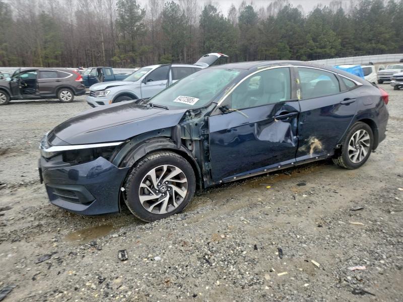 HONDA CIVIC EX 2018 with VIN 2HGFC2F71JH570251 - Photo from auction