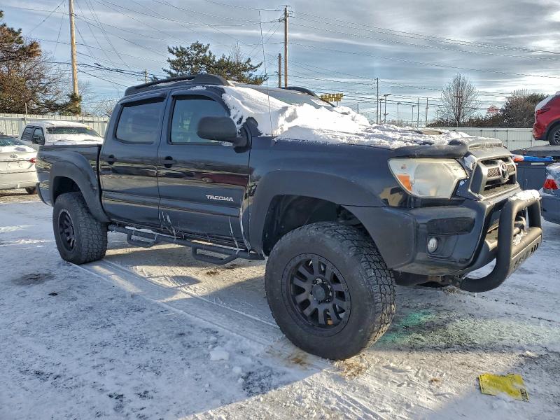 Photo 4 from auction – 2014 TOYOTA TACOMA DOU with VIN 5TFLU4EN5EX087728