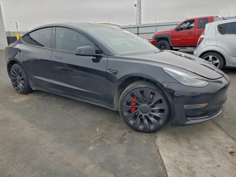 Photo 4 from auction – 2023 TESLA MODEL 3 with VIN 5YJ3E1EC6PF693837