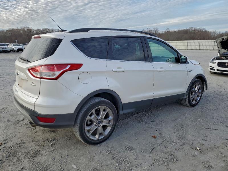 Photo 3 from auction – 2014 FORD ESCAPE SE with VIN 1FMCU9G94EUB53292