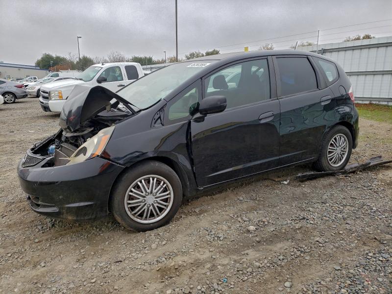 HONDA FIT 2012 with VIN JHMGE8H39CC023601 - Photo from auction