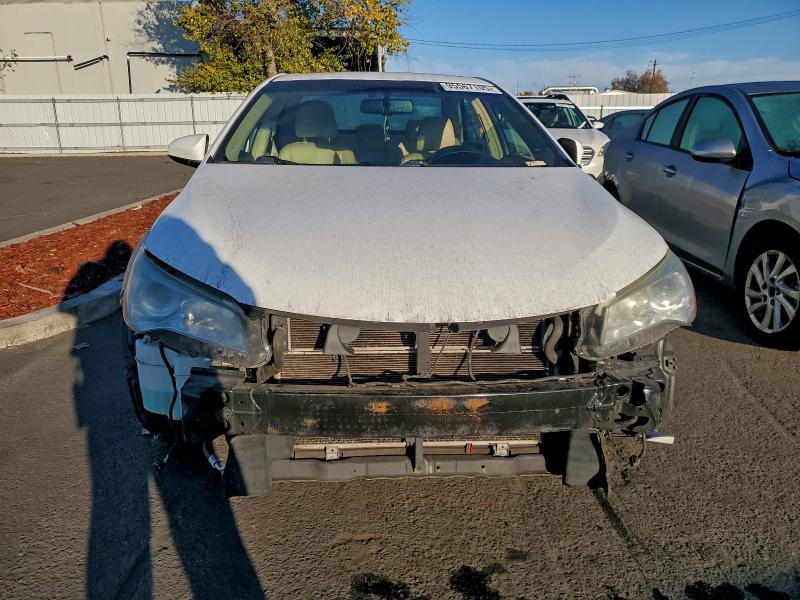 Photo 5 from auction – 2015 TOYOTA CAMRY HYBR with VIN 4T1BD1FK2FU153746