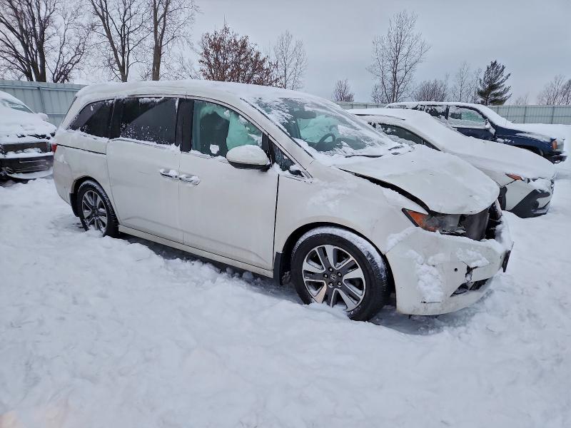 Photo 4 from auction – 2014 HONDA ODYSSEY TO with VIN 5FNRL5H93EB070289