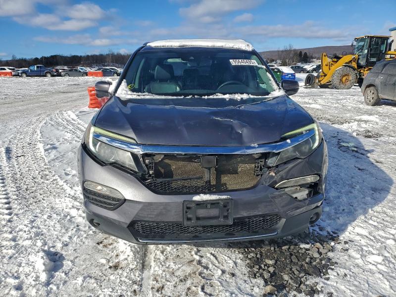Photo 5 from auction – 2016 HONDA PILOT TOUR with VIN 5FNYF6H92GB099861