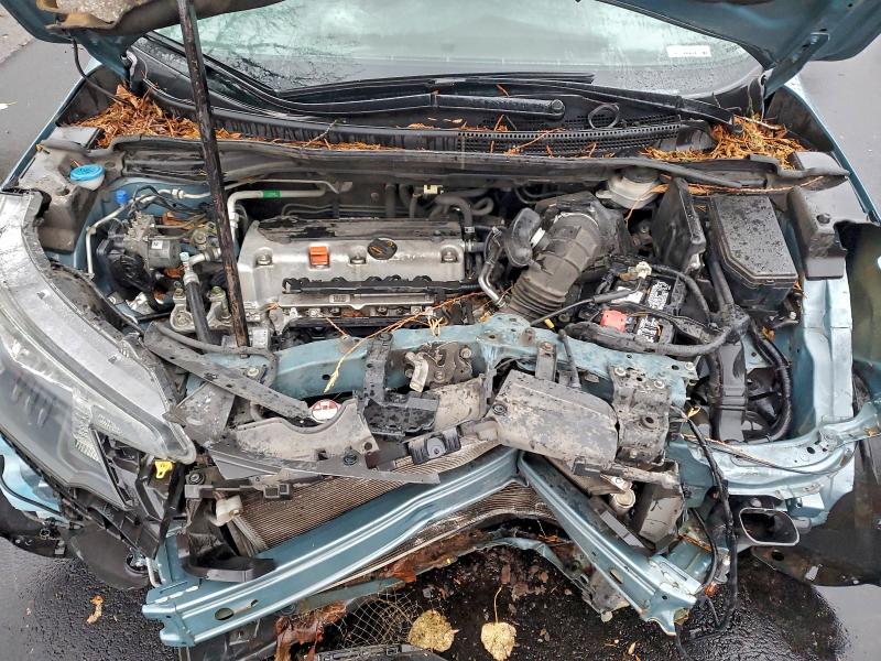 Photo 11 from auction – 2014 HONDA CR-V EXL with VIN 2HKRM4H7XEH670945