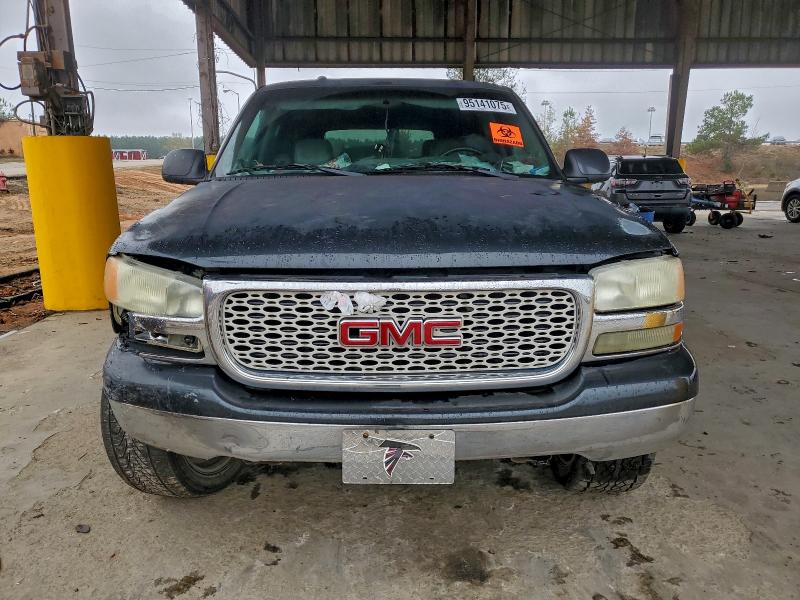 Photo 5 from auction – 2003 GMC YUKON with VIN 1GKEC13VX3R270903