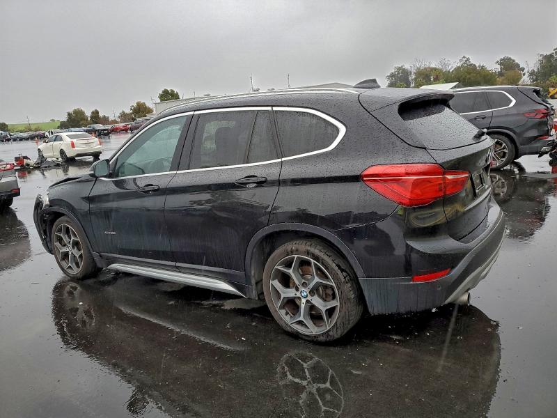 Photo 2 from auction – 2017 BMW X1 XDRIVE2 with VIN WBXHT3C34H5F83517
