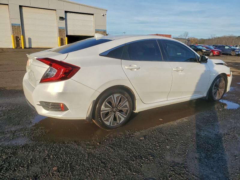 Photo 3 from auction – 2016 HONDA CIVIC with VIN 19XFC1F35GE205582