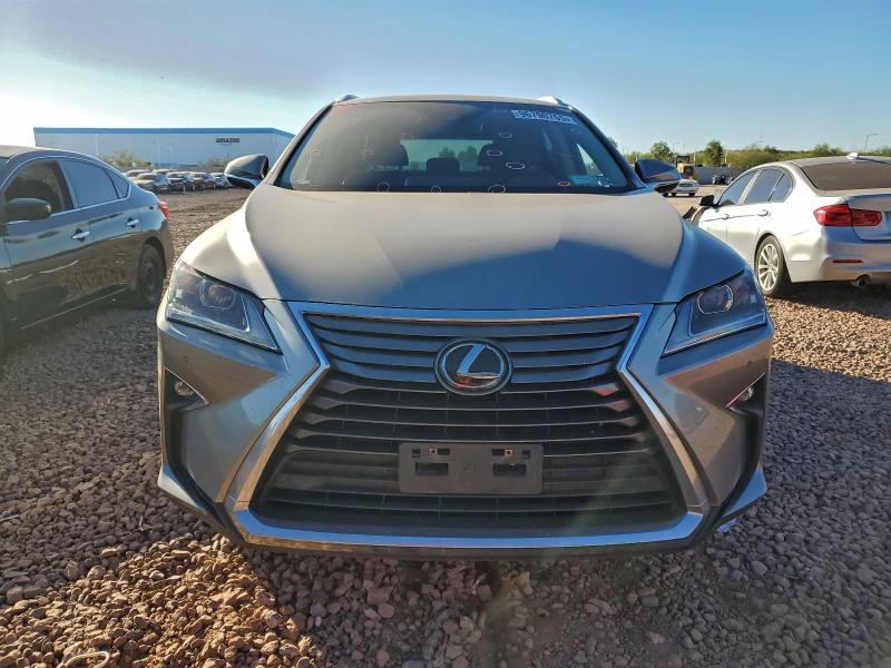 Photo 5 from auction – 2017 LEXUS RX with VIN 2T2BZMCA2HC128165