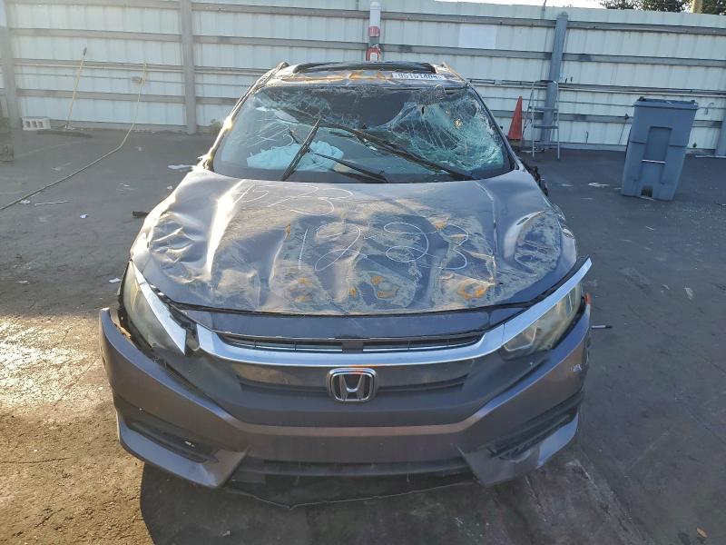 Photo 5 from auction – 2018 HONDA CIVIC with VIN 19XFC2F78JE024573