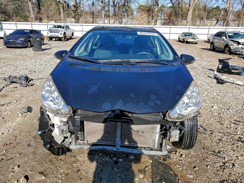 Photo 5 from auction – 2014 TOYOTA PRIUS C with VIN JTDKDTB3XE1077255