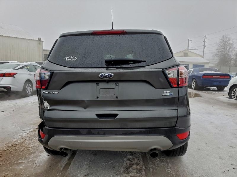 Photo 6 from auction – 2018 FORD ESCAPE SE with VIN 1FMCU9GDXJUB65803