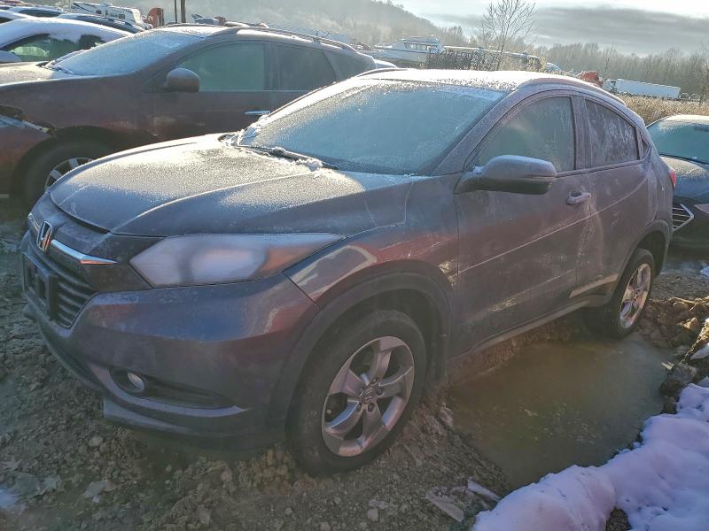 HONDA HRV 2016 with VIN 3CZRU6H71GM702071 - Photo from auction