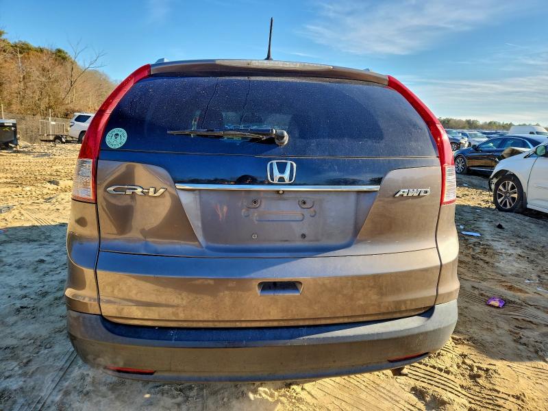 Photo 6 from auction – 2014 HONDA CR-V EXL with VIN 2HKRM4H75EH620504