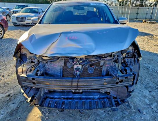 Photo 5 from auction – 2015 NISSAN SENTRA S with VIN 3N1AB7AP2FY308355