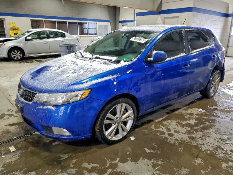 KIA FORTE SX 2011 with VIN KNAFW5A31B5412929 - Photo from auction