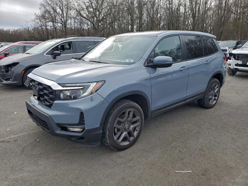 HONDA PASSPORT E 2023 with VIN 5FNYF8H53PB010923 - Photo from auction