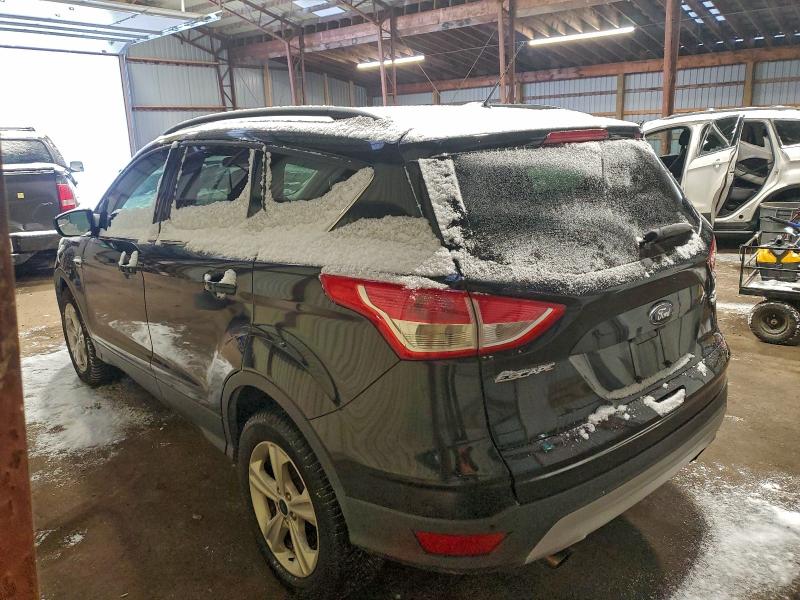 Photo 2 from auction – 2016 FORD ESCAPE SE with VIN 1FMCU9GX2GUA56965