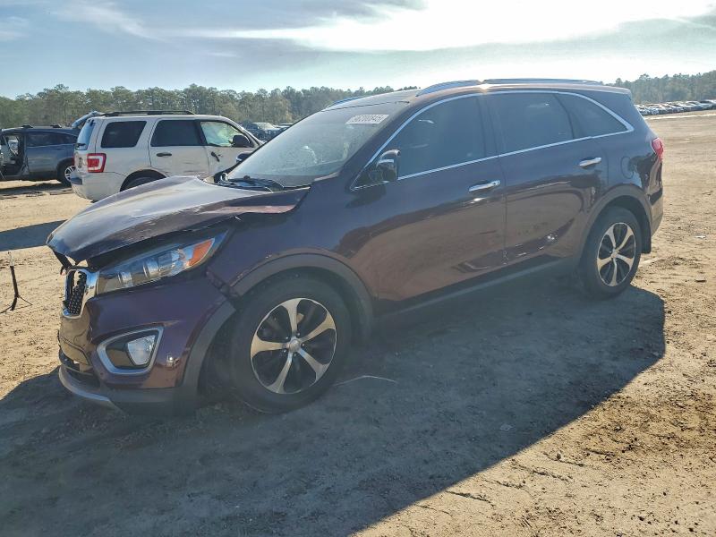 KIA SORENTO EX 2016 with VIN 5XYPH4A55GG128067 - Photo from auction