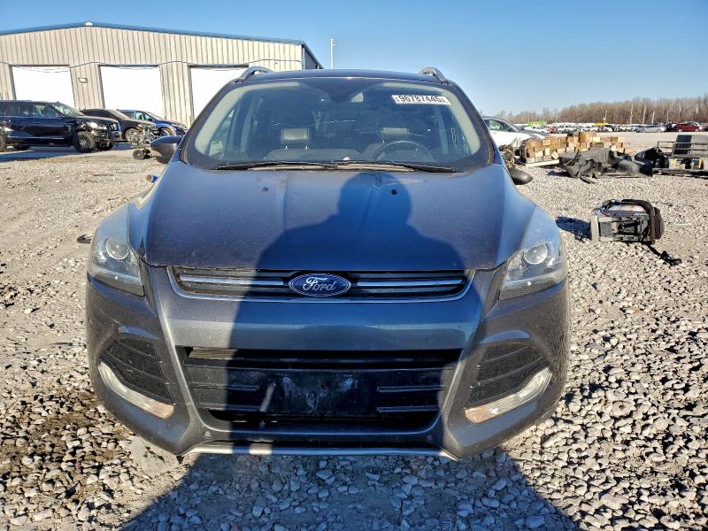 Photo 5 from auction – 2016 FORD ESCAPE TIT with VIN 1FMCU0J99GUA98149