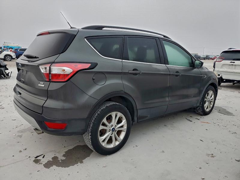Photo 3 from auction – 2018 FORD ESCAPE SE with VIN 1FMCU0GD1JUA65780