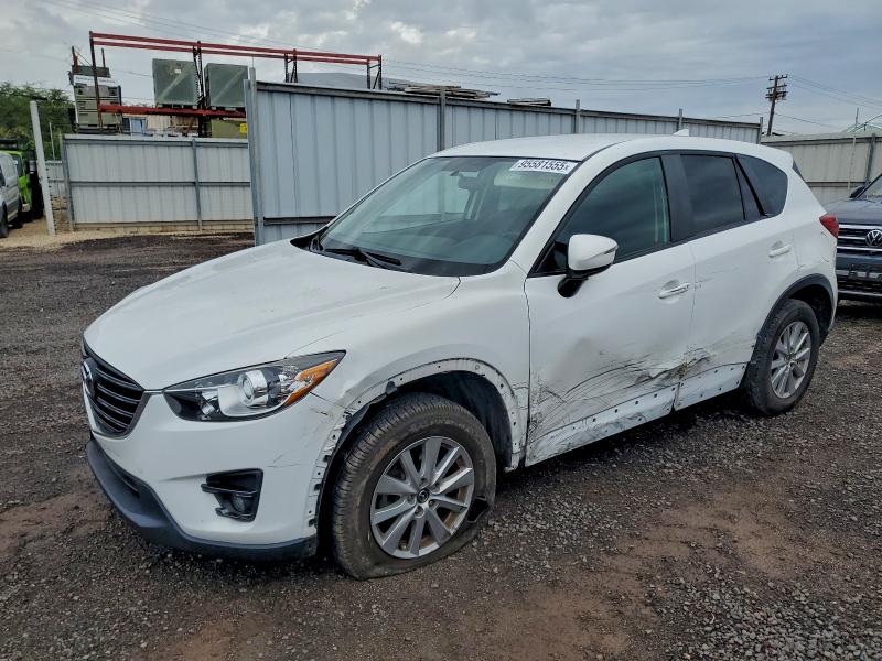 MAZDA CX-5 TOURI 2016 with VIN JM3KE2CY5G0863059 - Photo from auction