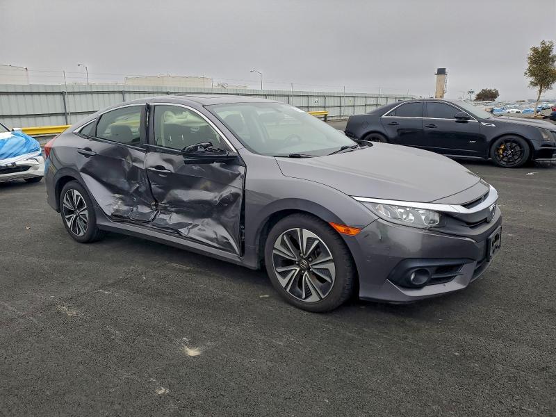 Photo 4 from auction – 2018 HONDA CIVIC with VIN JHMFC1F79JX044226