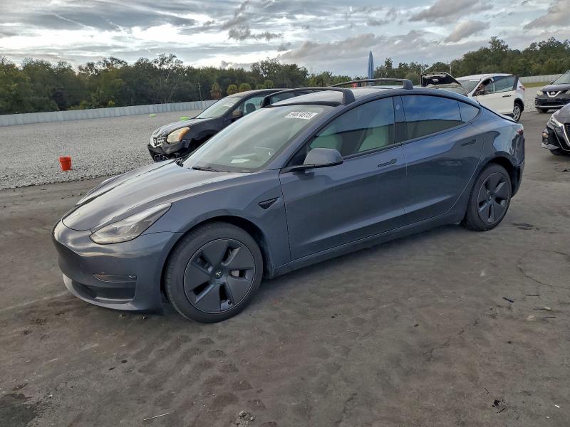 TESLA MODEL 3 2023 with VIN 5YJ3E1EA9PF665691 - Photo from auction