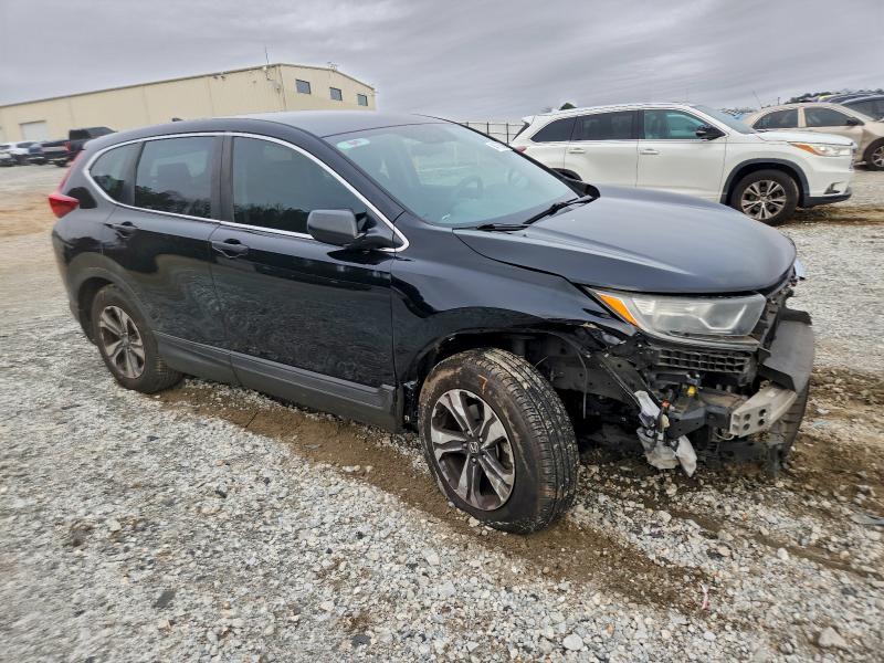 Photo 4 from auction – 2017 HONDA CR-V LX with VIN 7FARW5H34HE011232