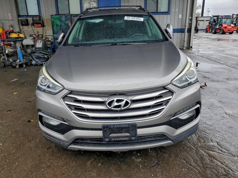 Photo 5 from auction – 2017 HYUNDAI SANTA FE S with VIN 5NMZU3LB0HH016589