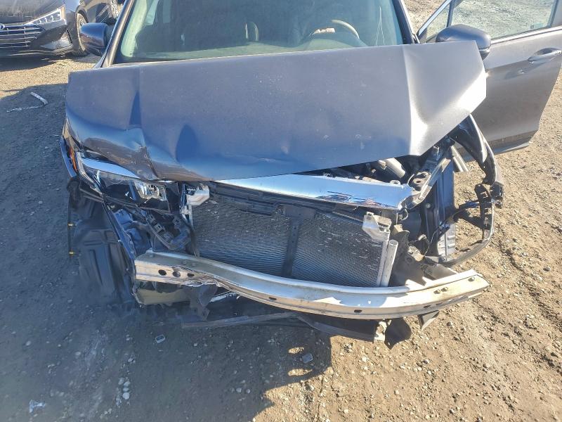 Photo 11 from auction – 2021 HONDA RIDGELINE with VIN 5FPYK3F50MB014674