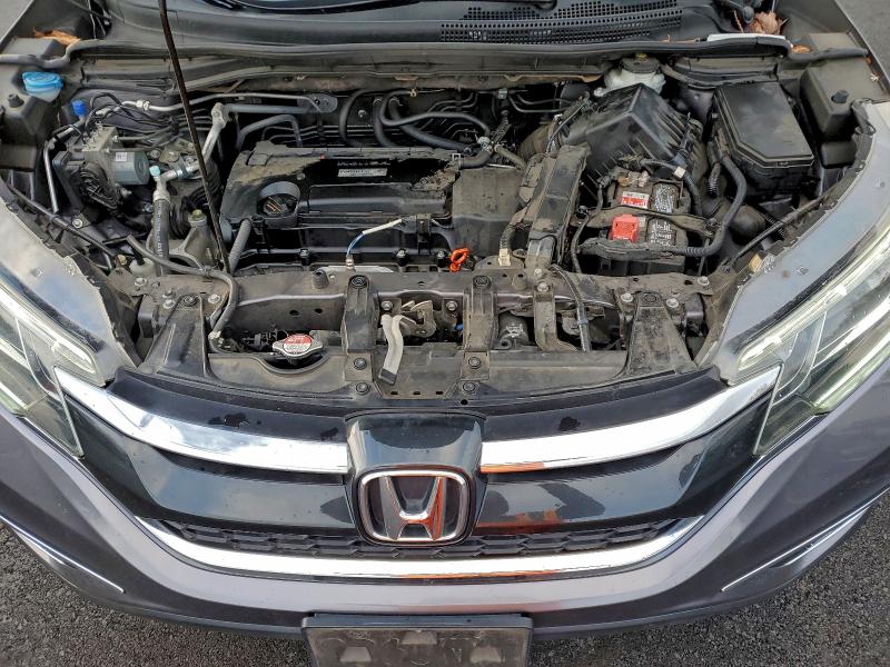 Photo 11 from auction – 2016 HONDA CR-V EX with VIN 3CZRM3H58GG700586