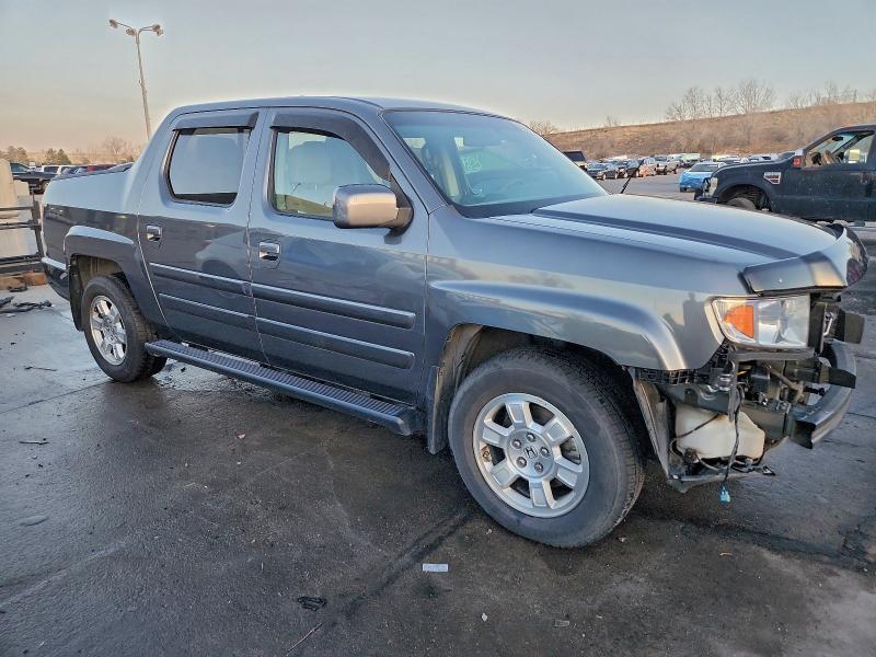 Photo 4 from auction – 2011 HONDA RIDGELINE with VIN 5FPYK1F42BB005676