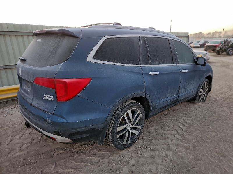 Photo 3 from auction – 2017 HONDA PILOT TOUR with VIN 5FNYF6H94HB034379