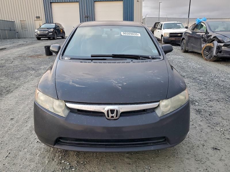 Photo 5 from auction – 2007 HONDA CIVIC DX with VIN 2HGFA16357H020797