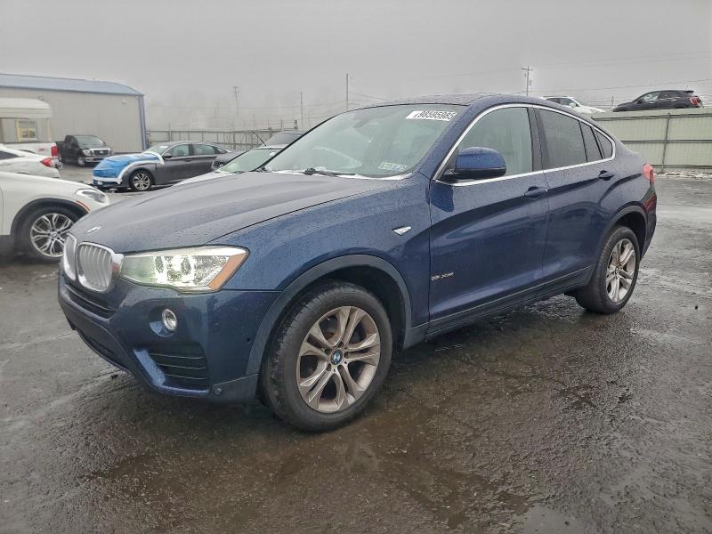 BMW X4 XDRIVE2 2015 with VIN 5UXXW3C51F0M89263 - Photo from auction