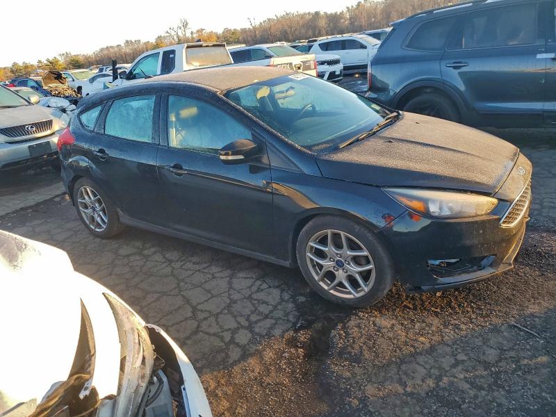 Photo 4 from auction – 2015 FORD FOCUS SE with VIN 1FADP3K29FL372057