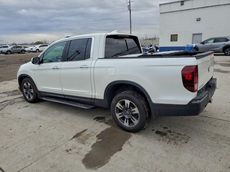 Photo 2 from auction – 2017 HONDA RIDGELINE with VIN 5FPYK3F76HB032555