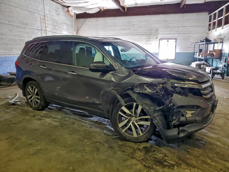 Photo 4 from auction – 2017 HONDA PILOT ELIT with VIN 5FNYF6H02HB103703