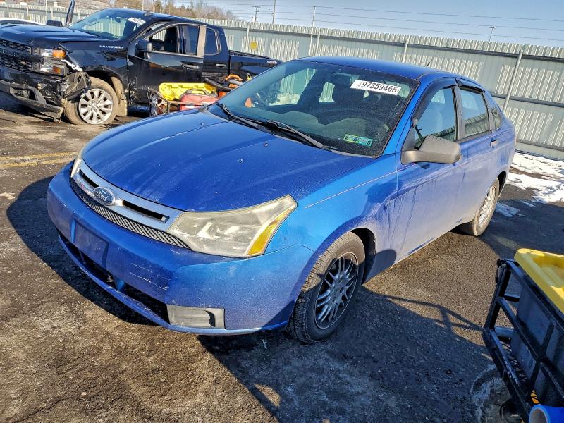 FORD FOCUS SE 2011 with VIN 1FAHP3FNXBW115004 - Photo from auction