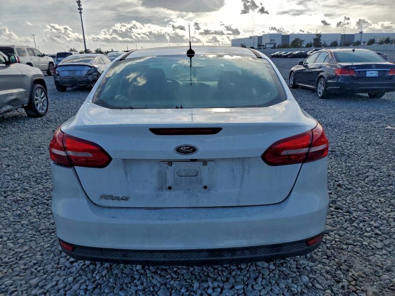 Photo 6 from auction – 2016 FORD FOCUS S with VIN 1FADP3E29GL339346