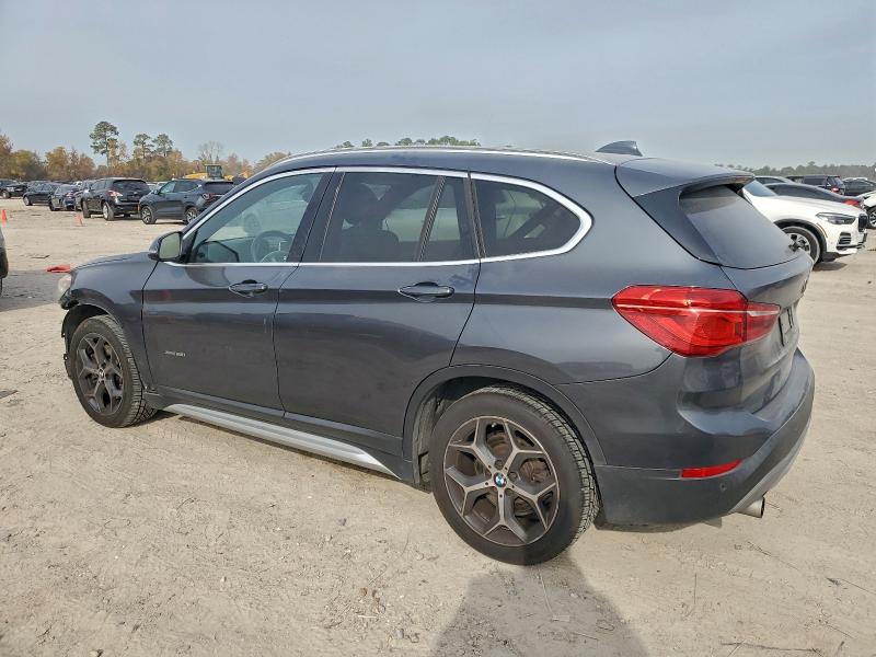 Photo 2 from auction – 2016 BMW X1 with VIN WBXHT3C37GP884895